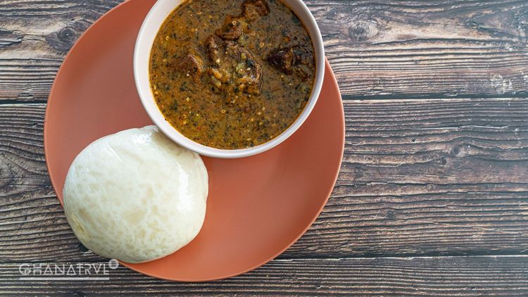 Ghanaian Cuisine Guide: Fufu<br>Fufu served with rich and spicy soup